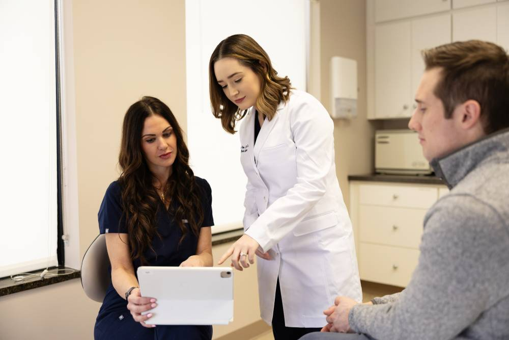 A woman receiving a consultation at a clinic